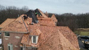 Roofing contractors installing cedar shake roofing in South Barrington